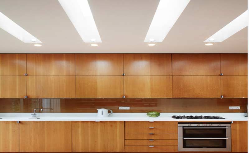 a well balanced designed modular kitchen in high gloss laminates with hettich fittings in delhi and gurgaon