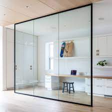 interiors of kitchen bedroom with wardrobes and study table and a bunk bed by design indian kitchen company in gurgaon and delhi